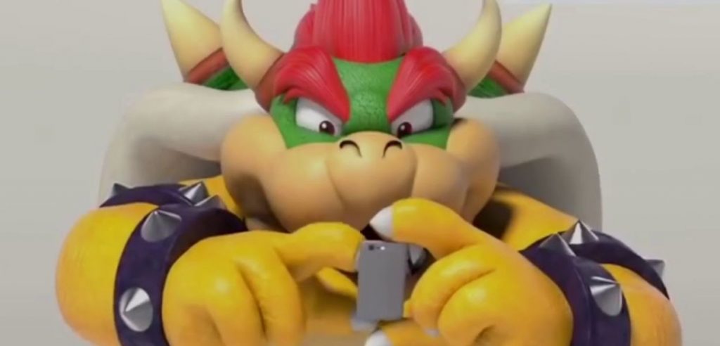 bowser guarda uno smartphone