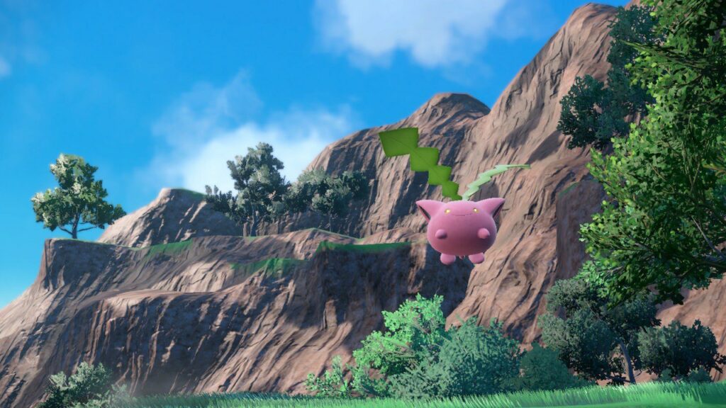 Un Hoppip nella natura di Paldea, regione di Pokémon Scarlatto e Violetto