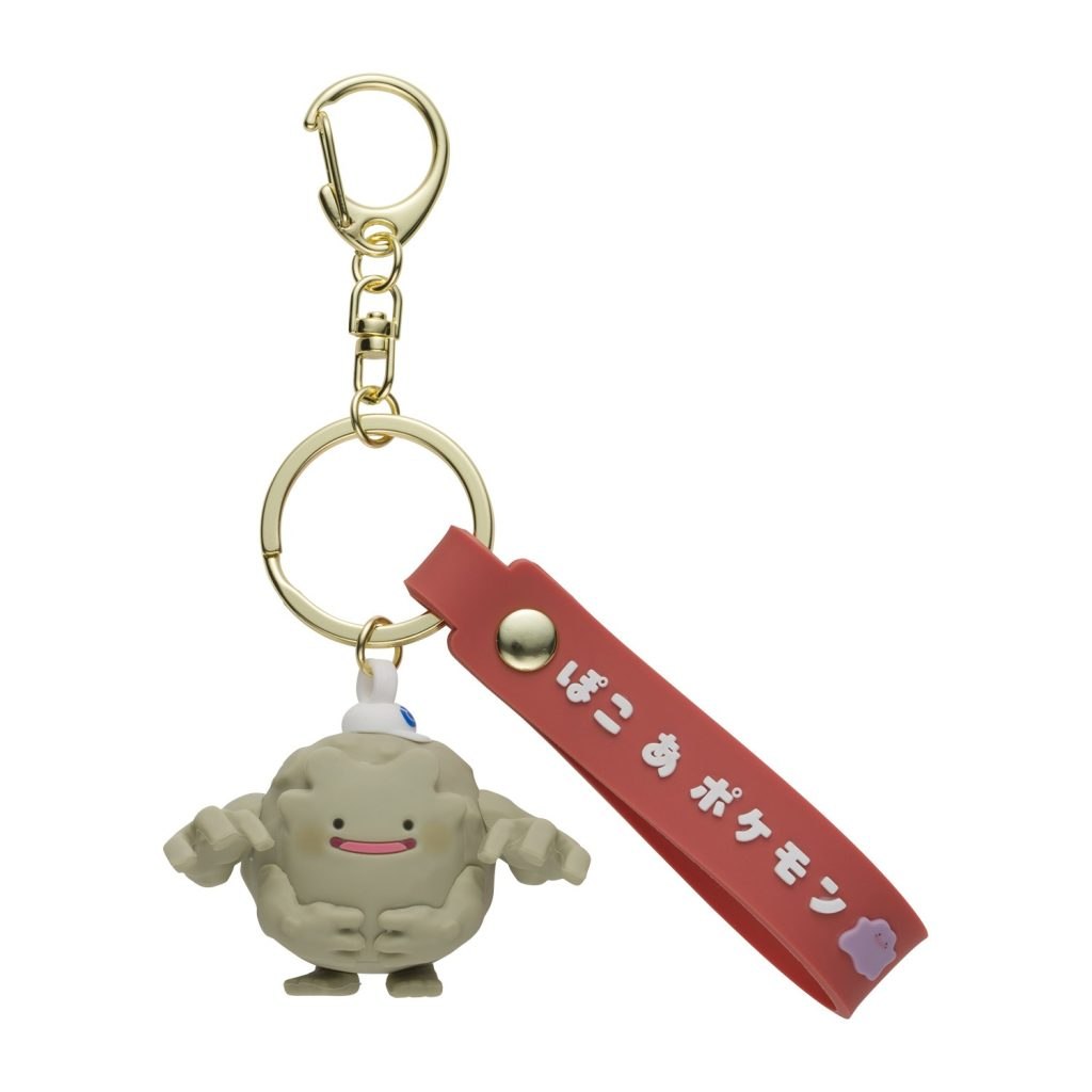 Portachiavi 3D di Ditto trasformato in Graveler con cappellino blu, collezione Pokopia Pokémon Center